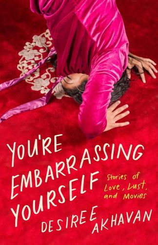 Book cover as a photo with red background, partial shot of a person wearing pink velvet upside down in a headstand